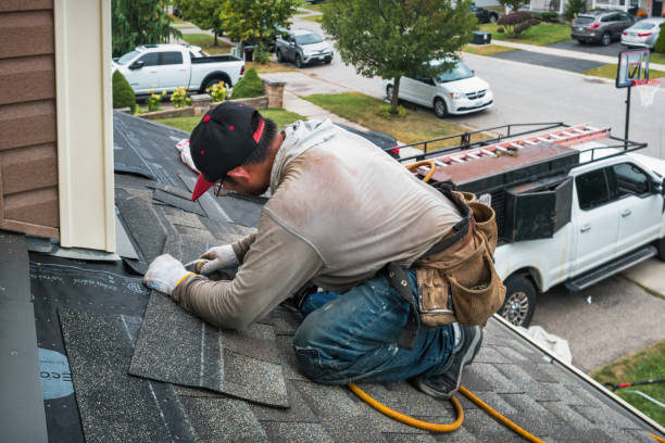 Professional Roofing technician working in North Reading, MA